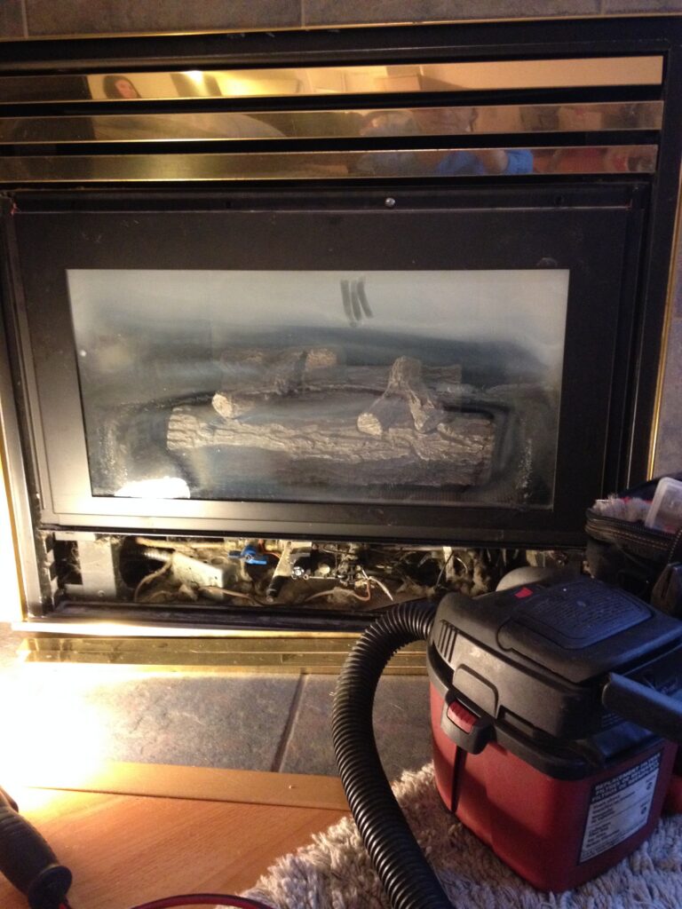 Gas fireplace before professional service