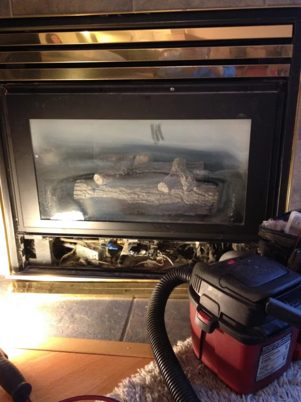 Gas fireplace before professional service