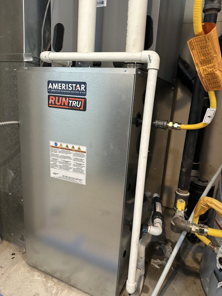 High-efficiency residential furnace and venting