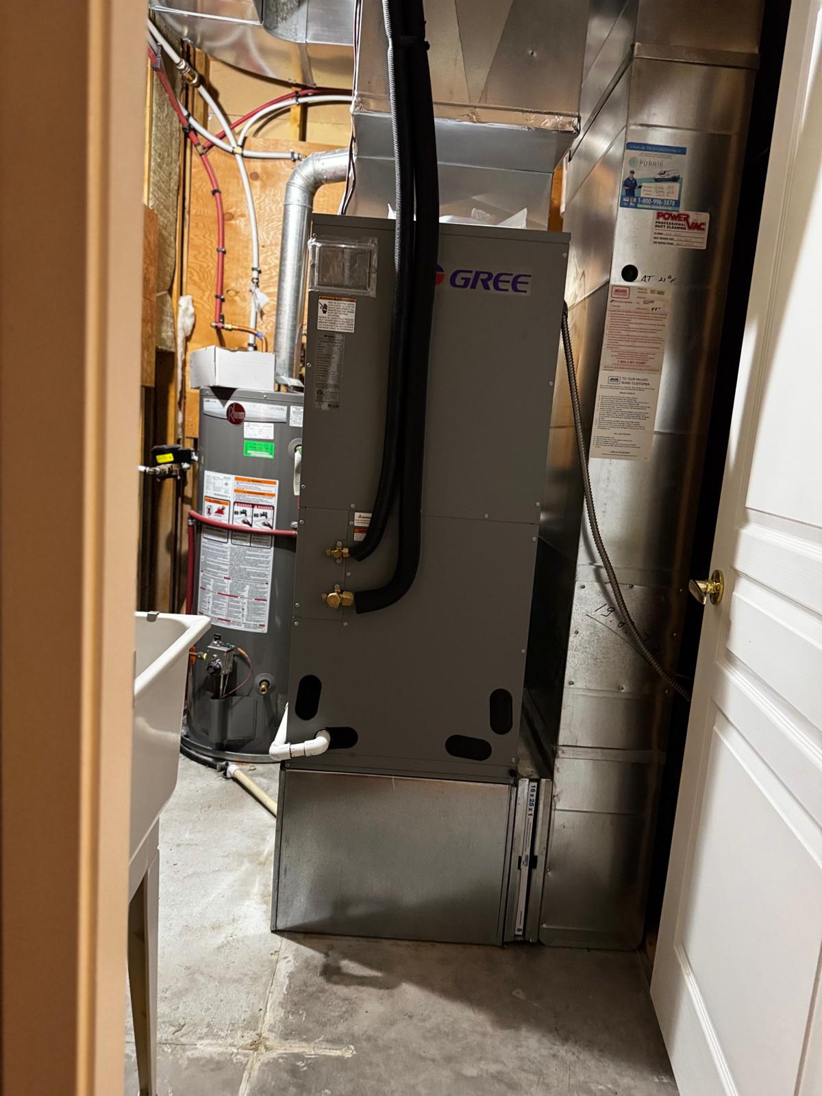 High-efficiency furnace installed in a utility closet