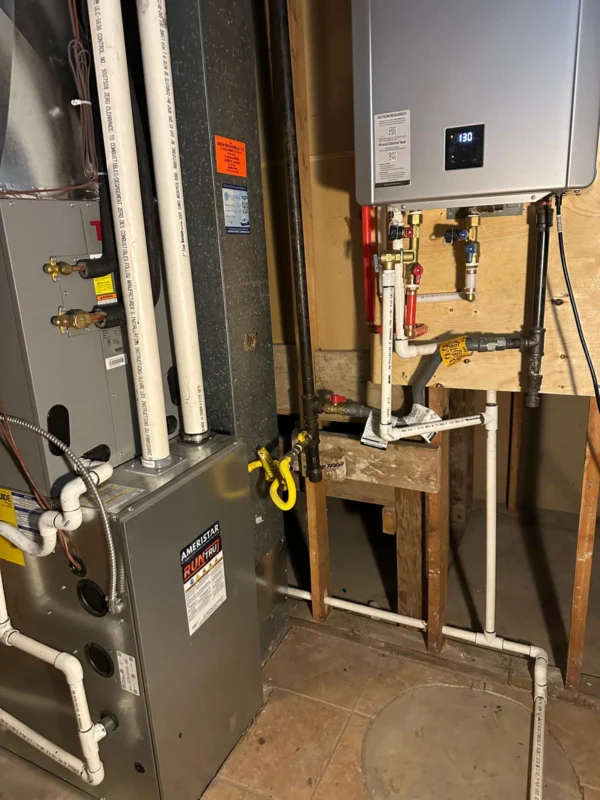 Furnace and tankless water-heating equipment in a mechanical room