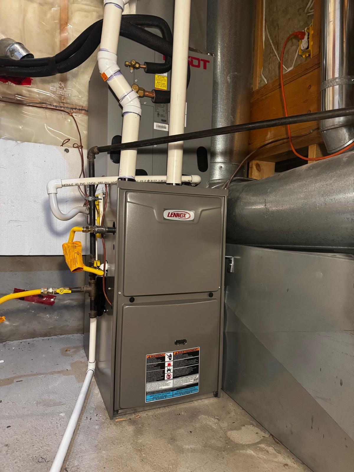 Residential furnace installation in a mechanical room